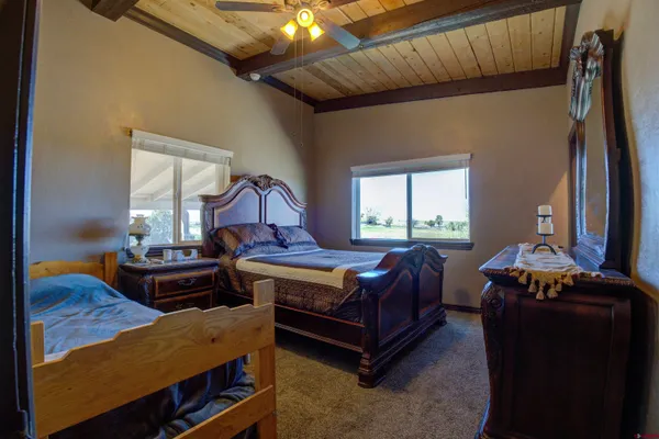 a living room with stainless steel appliances kitchen island granite countertop furniture and a kitchen view