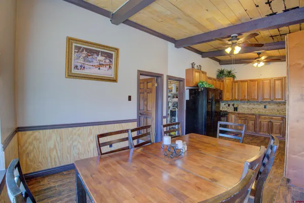 a view of a dining room with furniture