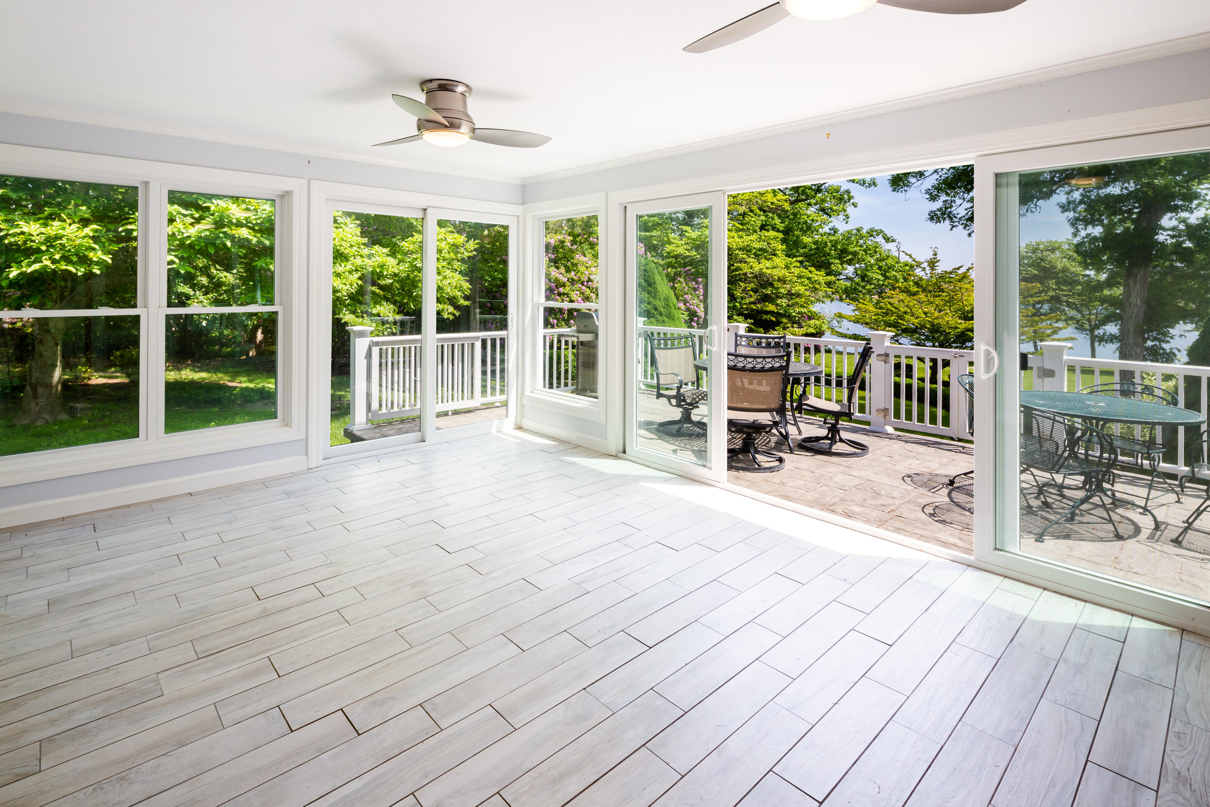 78 Wareham Road Marion, MA 02738 - Photo 24 of 47 a view of a room with wooden floor and deck