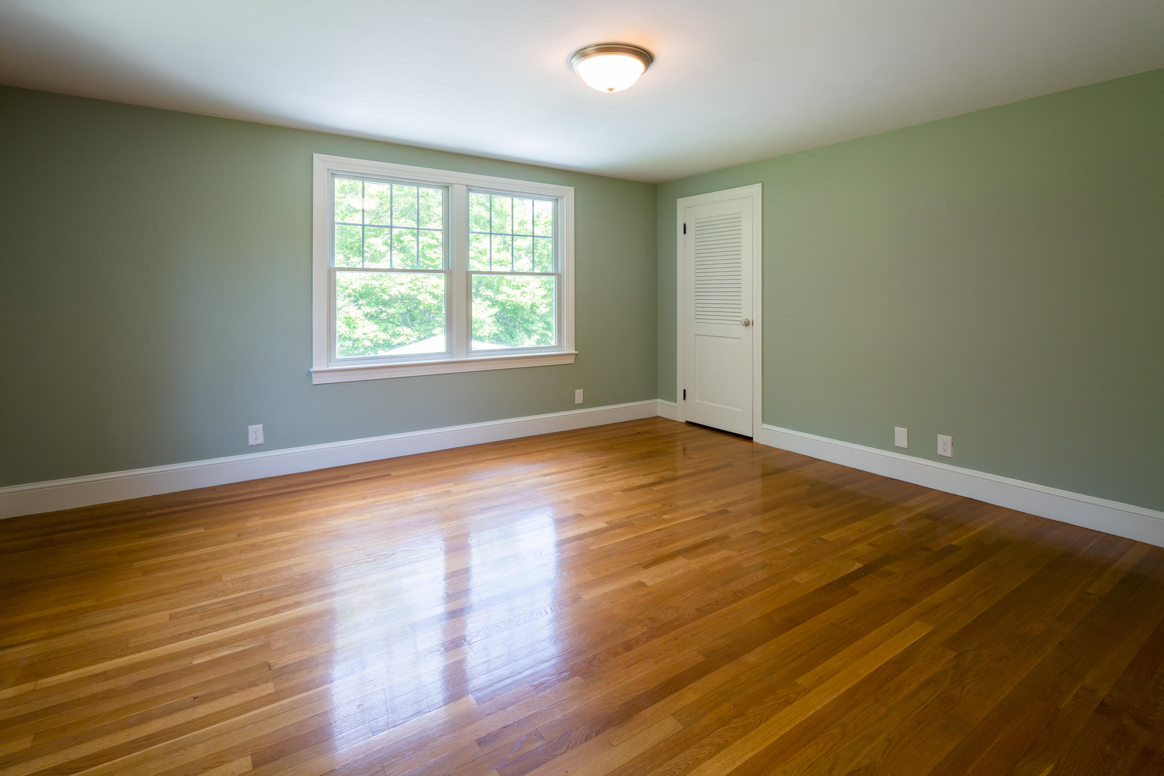 78 Wareham Road Marion, MA 02738 - Photo 42 of 47 an empty room with wooden floor and windows
