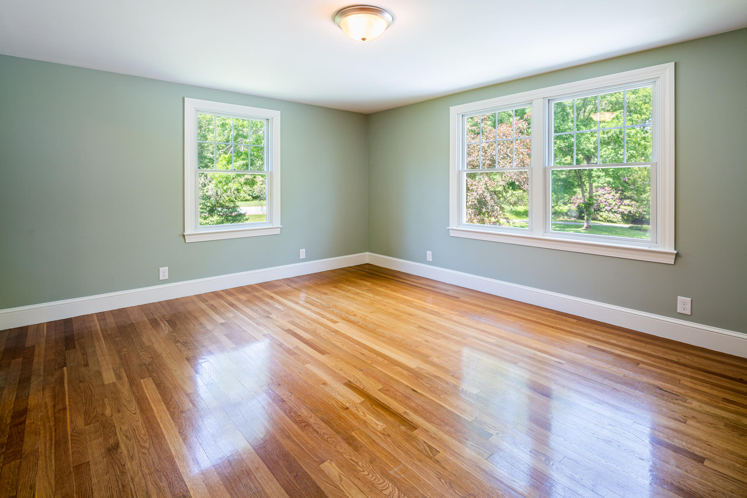 78 Wareham Road Marion, MA 02738 - Photo 43 of 47 a view of an empty room with wooden floor and a window