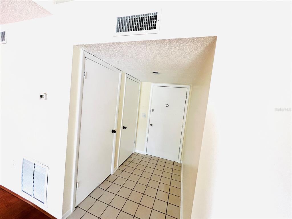 6057 Windhover Drive, Unit E08 Orlando, FL 32819 - Photo 16 of 19 a view of an empty room
