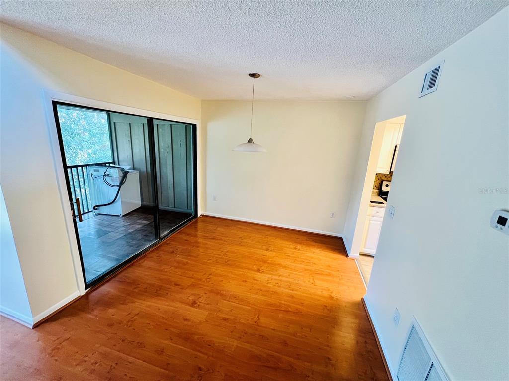 6057 Windhover Drive, Unit E08 Orlando, FL 32819 - Photo 6 of 19 a view of an empty room