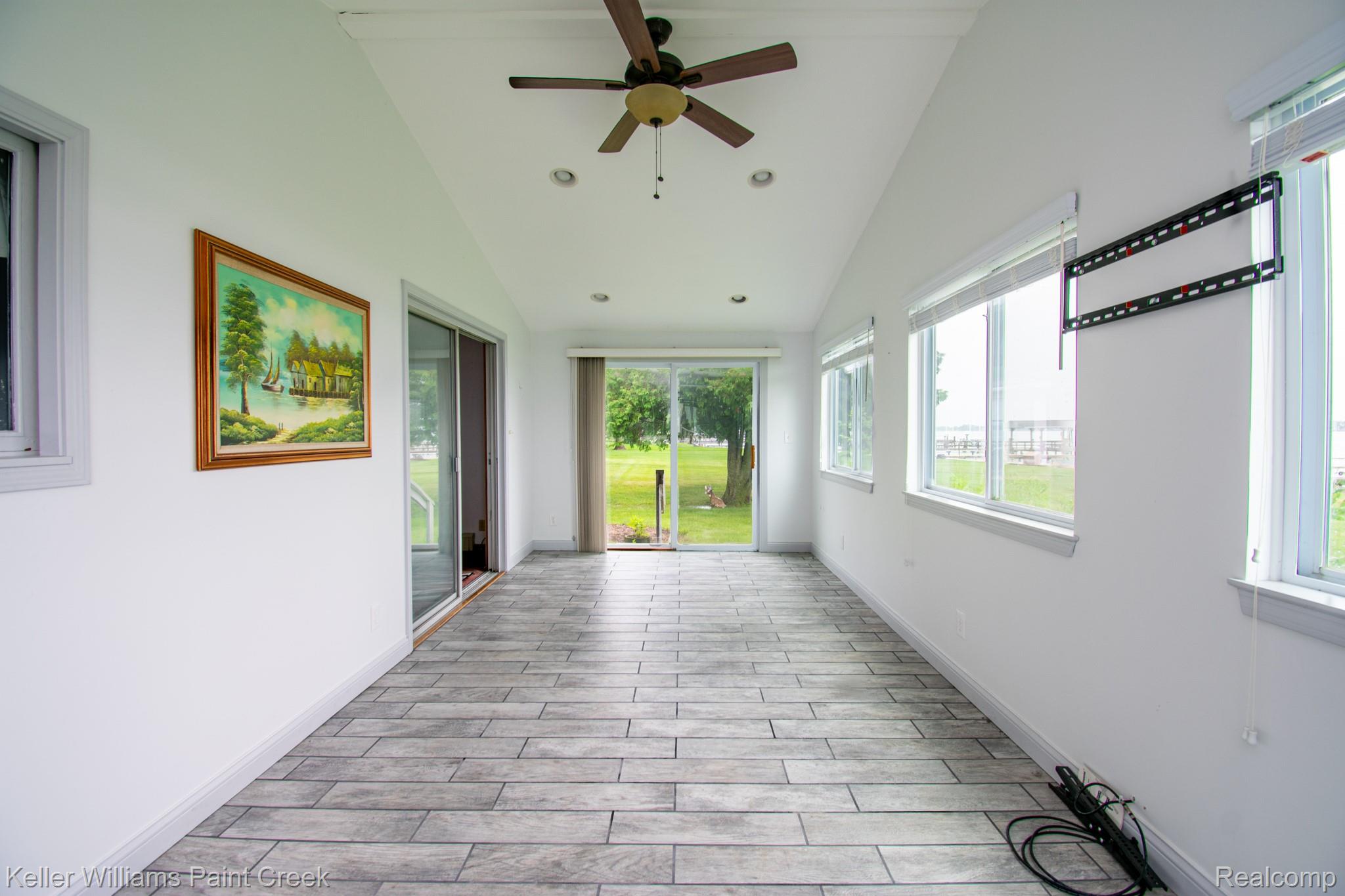 6533 River Road Marine City, MI 48039 - Photo 13 of 17 Unfurnished sunroom with lofted ceiling