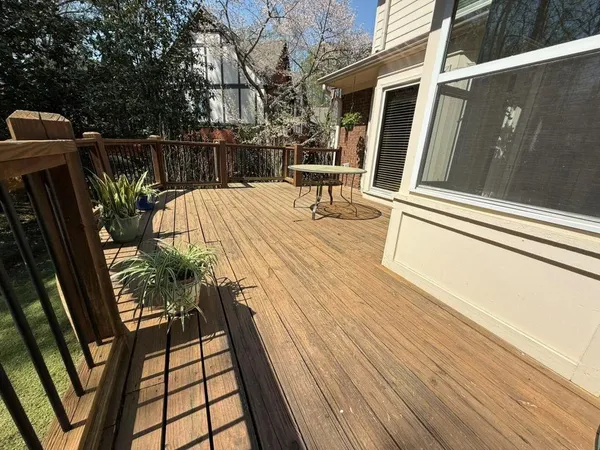 a view of balcony with furniture