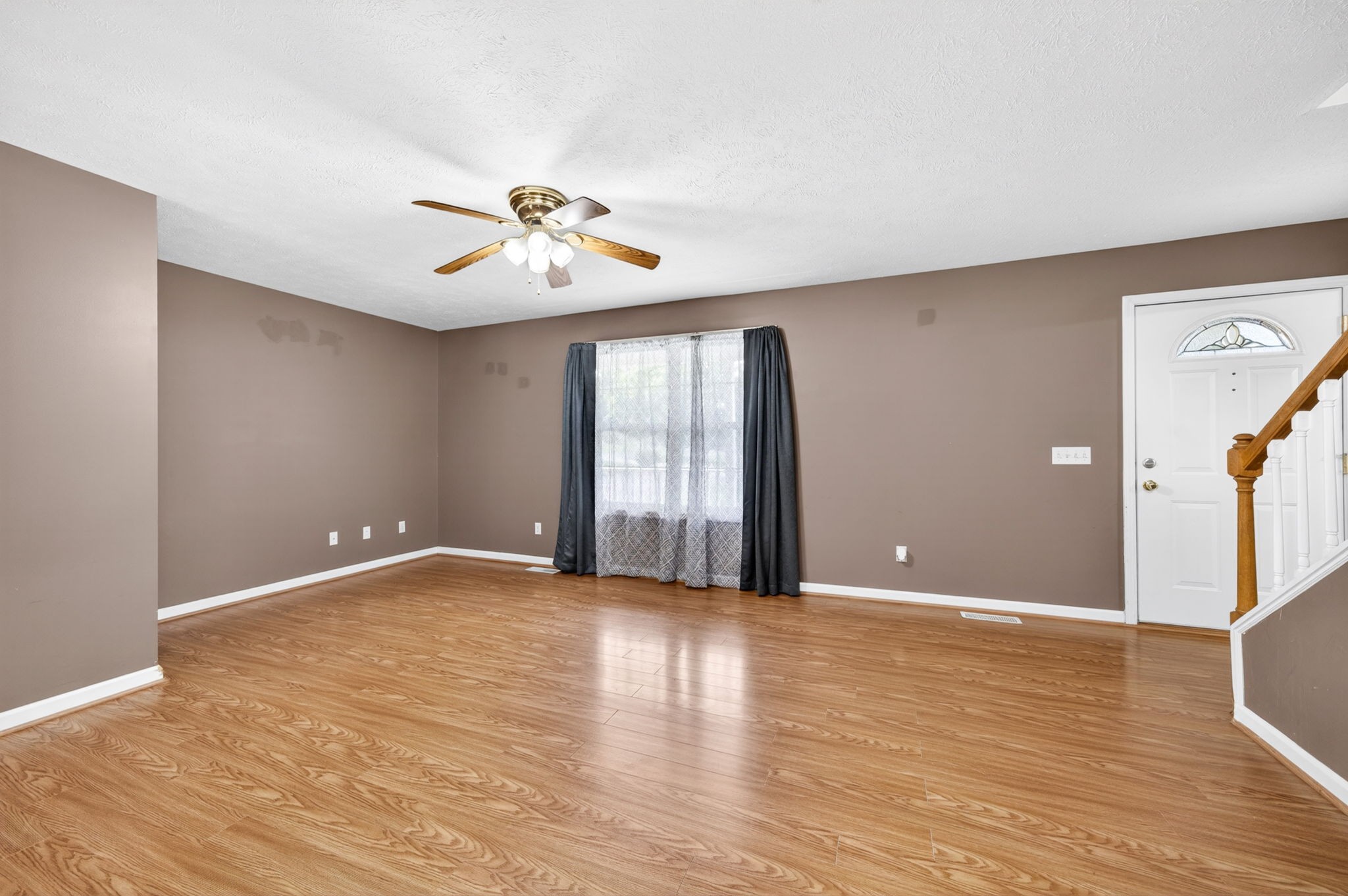 291 Poplar Point Lane Rickman, TN 38580 - Photo 9 of 41 a view of an empty room with window and wooden floor