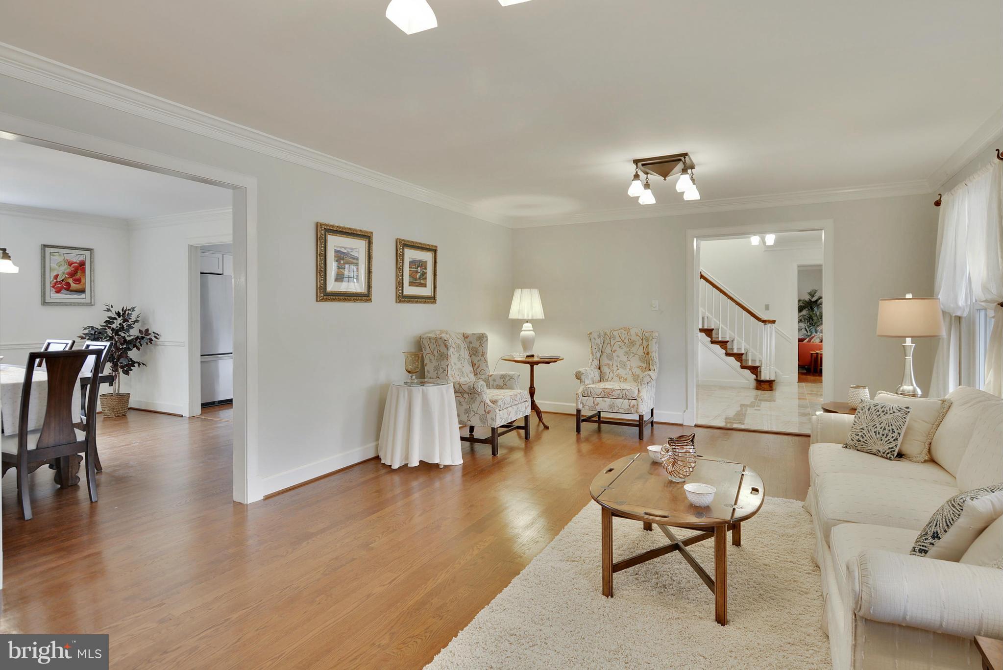 2811 Rifle Ridge Road Oakton, VA 22124 - Photo 3 of 30 a living room with furniture and wooden floor