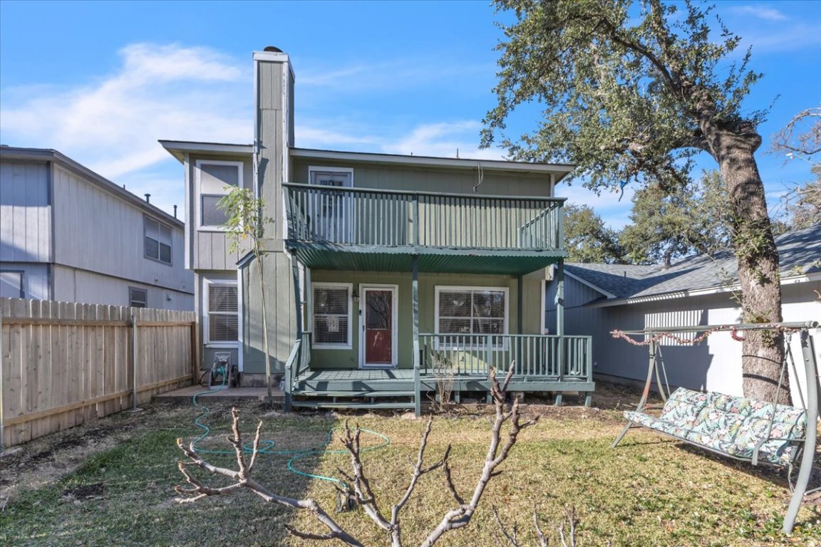 12717 Modena Trail Austin, TX 78729 - Photo 28 of 30 a front view of a house with swimming pool table and chairs