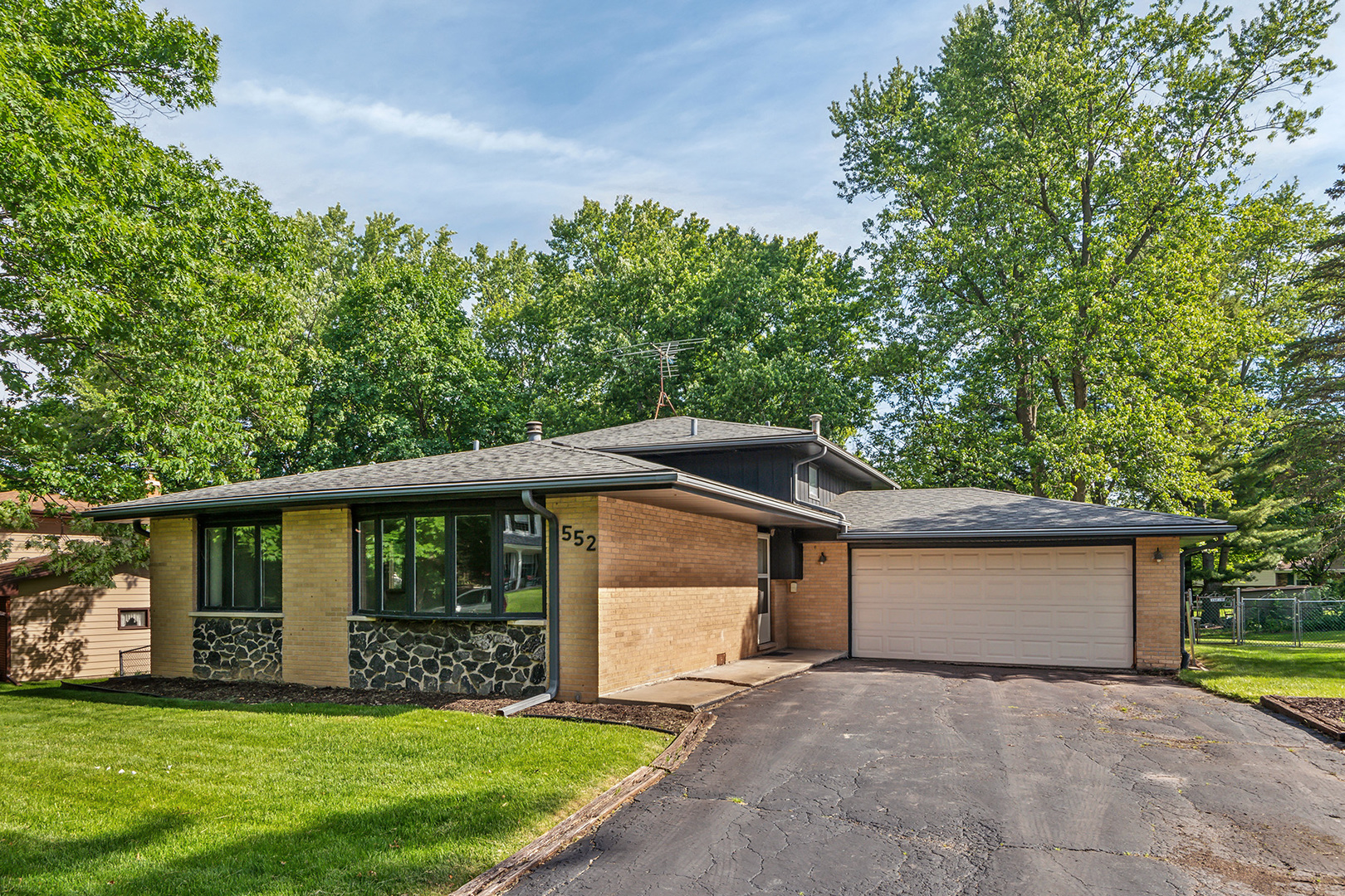 552 Hackberry Road Frankfort, IL 60423 - Photo 2 of 22 a view of a house with a yard and large tree