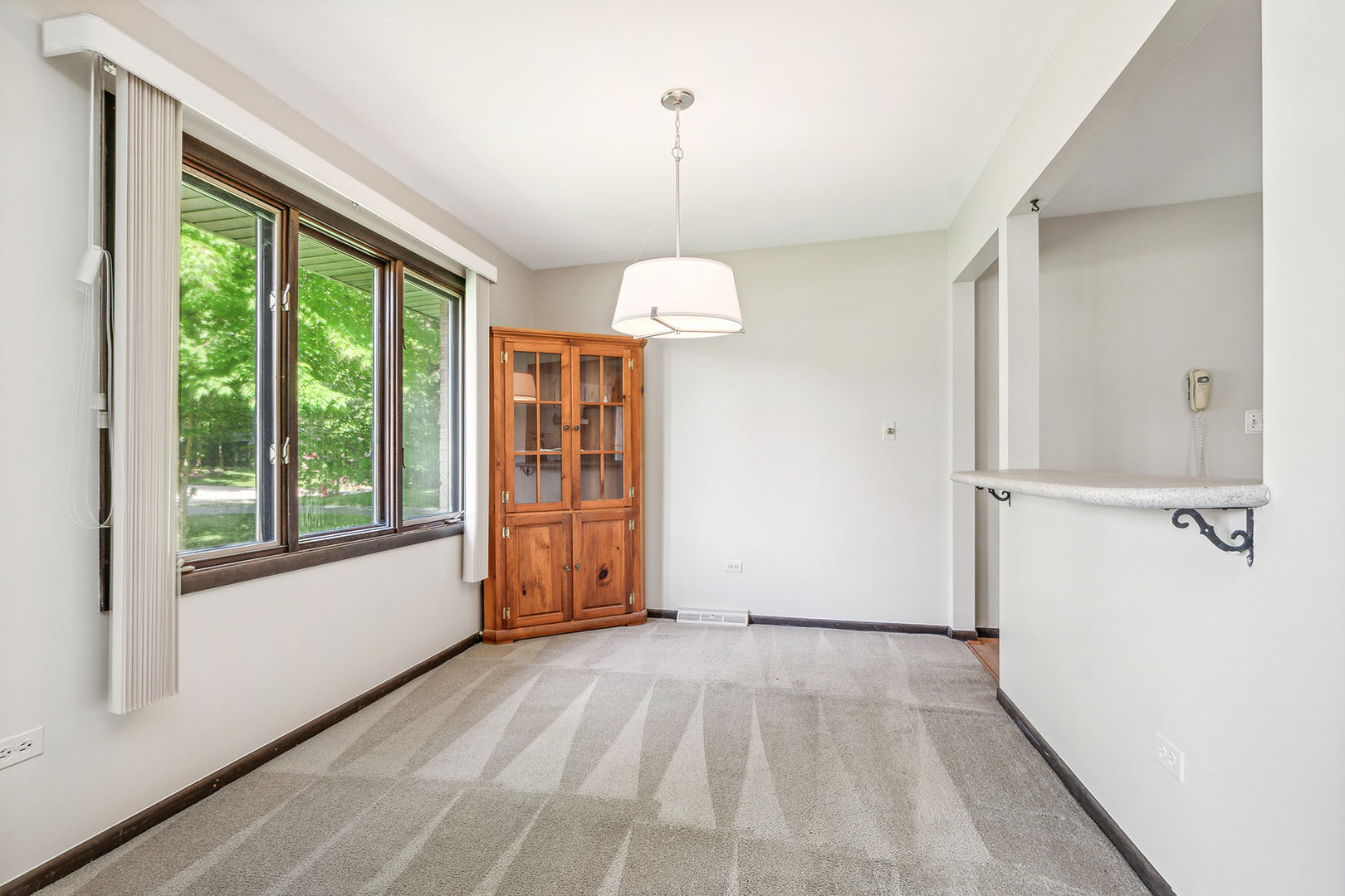 552 Hackberry Road Frankfort, IL 60423 - Photo 6 of 22 a view of a room with a window and wooden floor