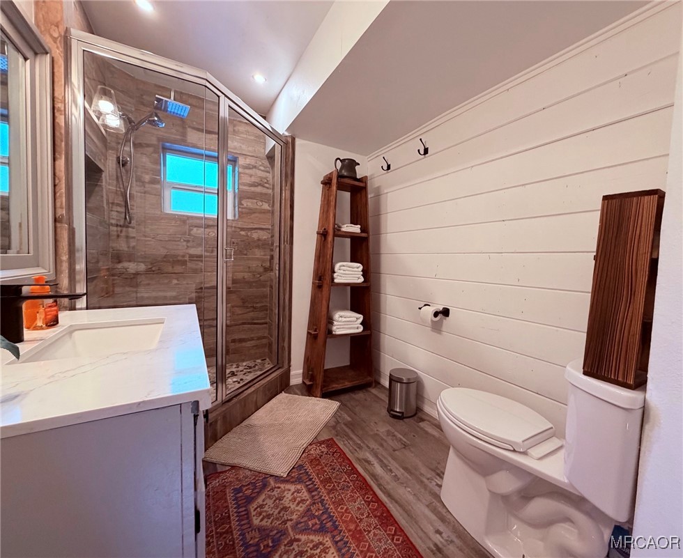 926 Kuffle Canyon Road Skyforest, CA 92385 - Photo 25 of 35 a bathroom with a sink a toilet and shower