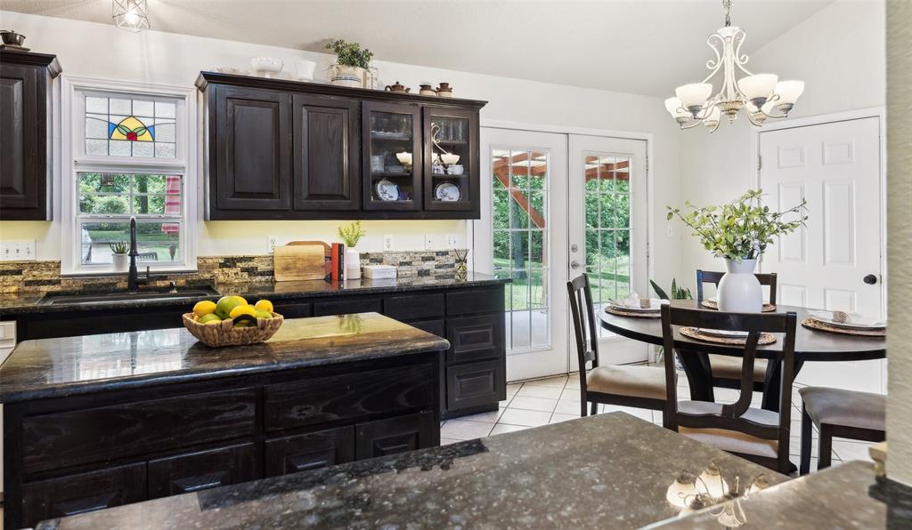 1000 Ballard Road Van Alstyne, TX 75495 - Photo 14 of 40 a living room with furniture and a fireplace