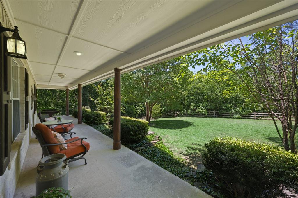 1000 Ballard Road Van Alstyne, TX 75495 - Photo 30 of 40 a view of a patio with chairs and a yard