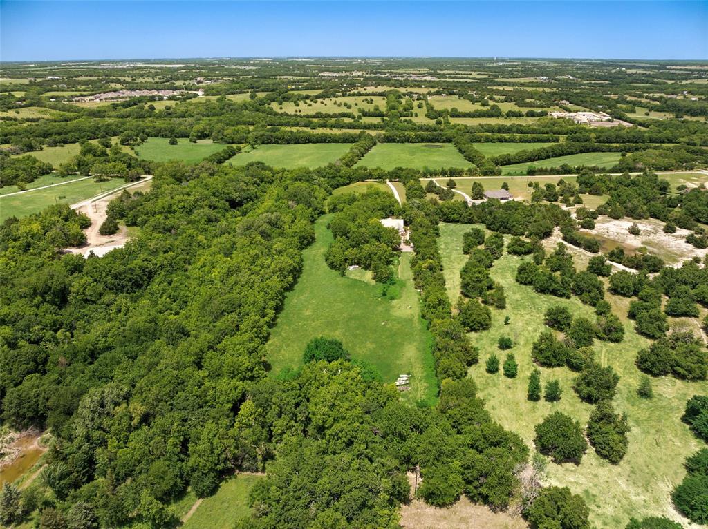 1000 Ballard Road Van Alstyne, TX 75495 - Photo 34 of 40 a view of a yard with an outdoor space