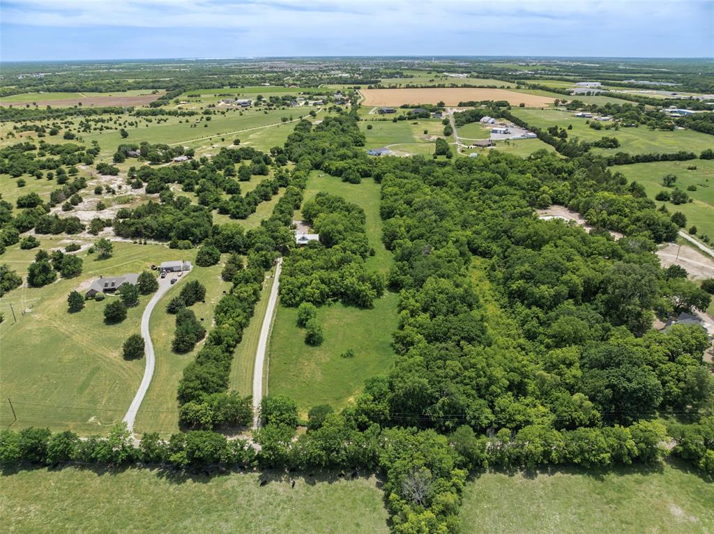 1000 Ballard Road Van Alstyne, TX 75495 - Photo 35 of 40 an aerial view of a residential houses with outdoor space and trees
