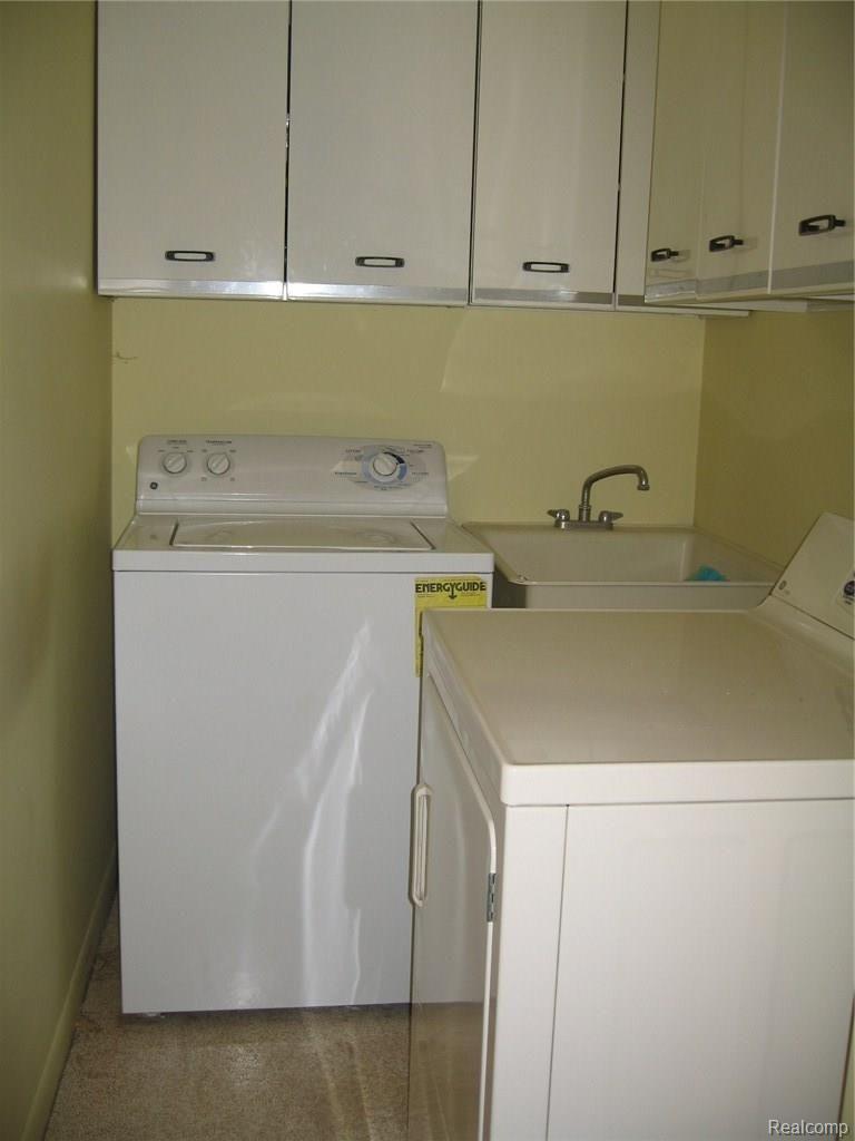 9025 East Potter Road Davison, MI 48423 - Photo 27 of 39 Main floor laundry