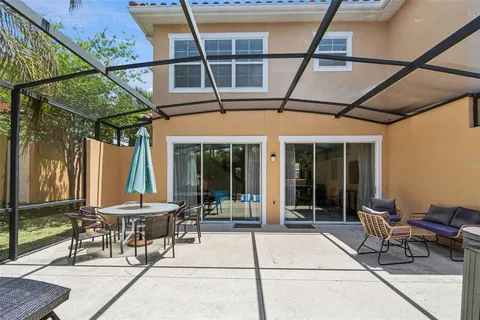 a view of swimming pool with outdoor seating