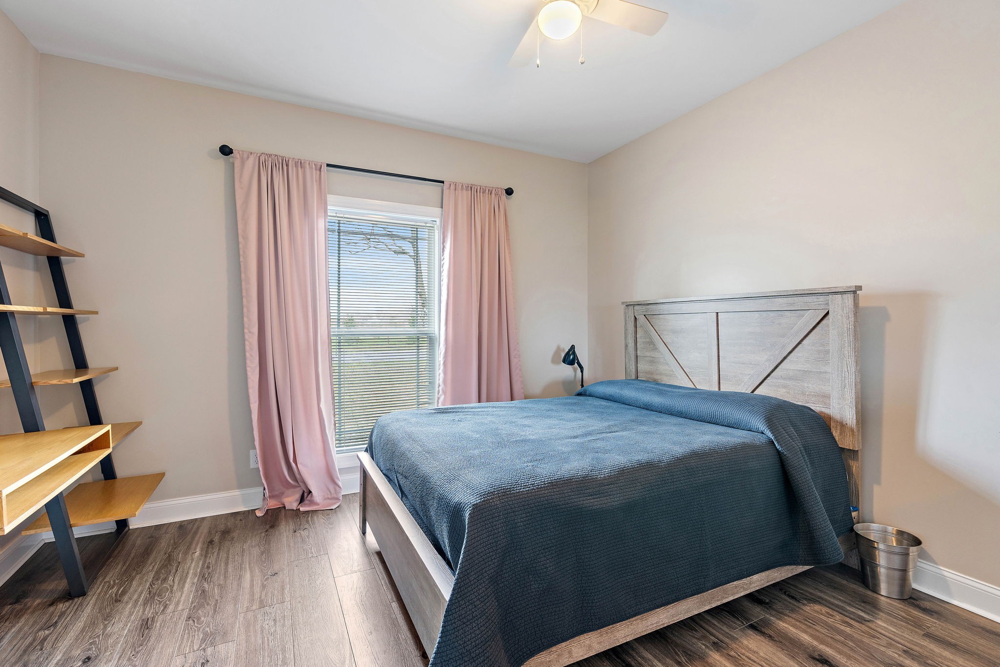 4233 Old Coopertown Road Springfield, TN 37172 - Photo 16 of 28 a bedroom with a bed and a window