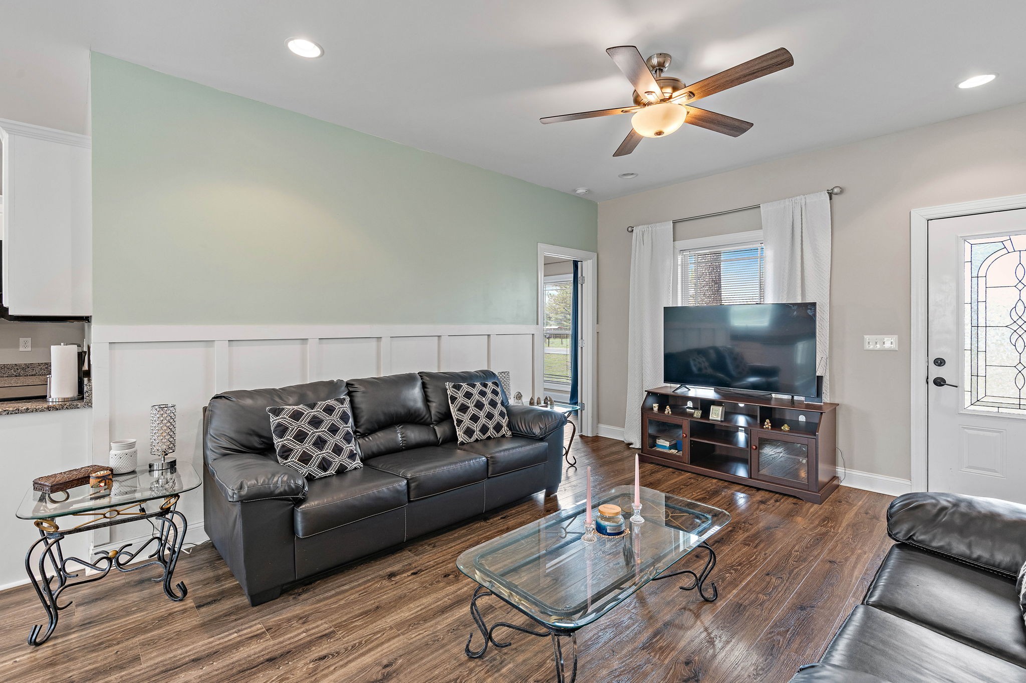 4233 Old Coopertown Road Springfield, TN 37172 - Photo 7 of 28 a living room with furniture and a flat screen tv