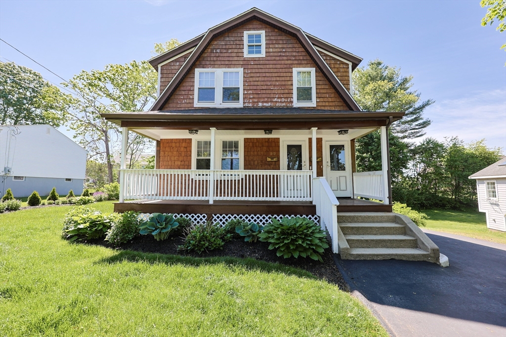 22 Stubb Street, Unit 1 Franklin, MA 02038 - Photo 1 of 42 a front view of a house with a yard