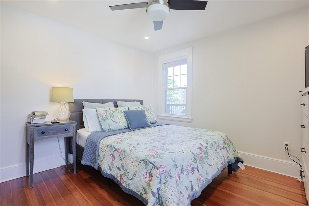 22 Stubb Street, Unit 1 Franklin, MA 02038 - Photo 14 of 42 a bedroom with bed and window