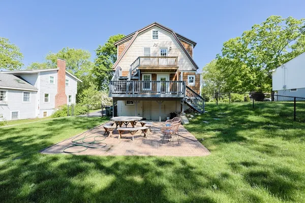 a view of yard with outdoor seating and green space