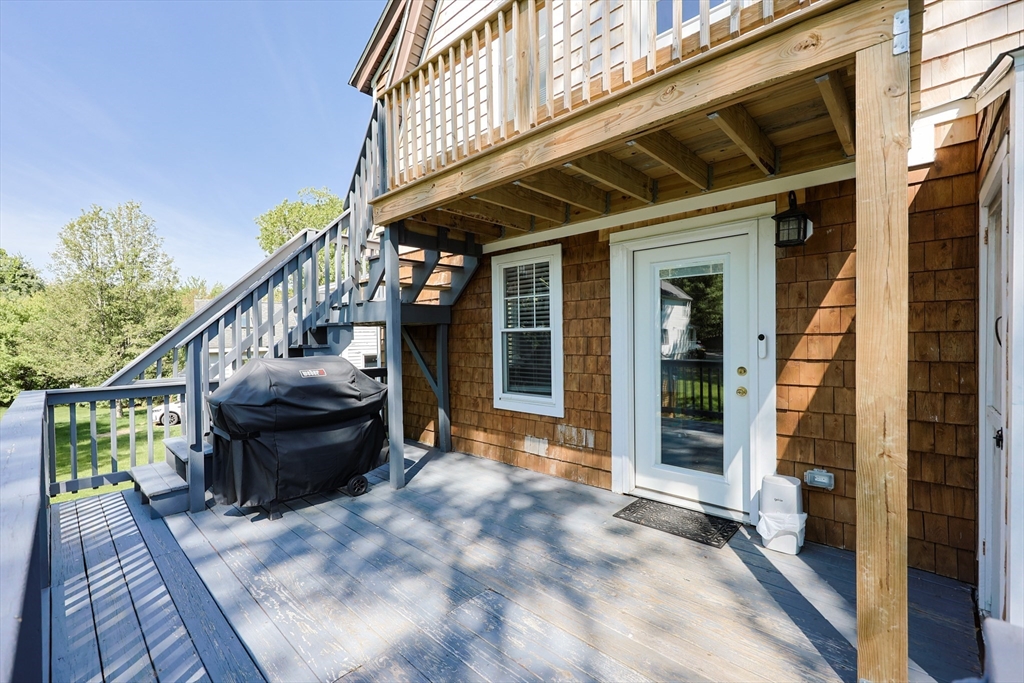 22 Stubb Street, Unit 1 Franklin, MA 02038 - Photo 40 of 42 a view of deck with patio
