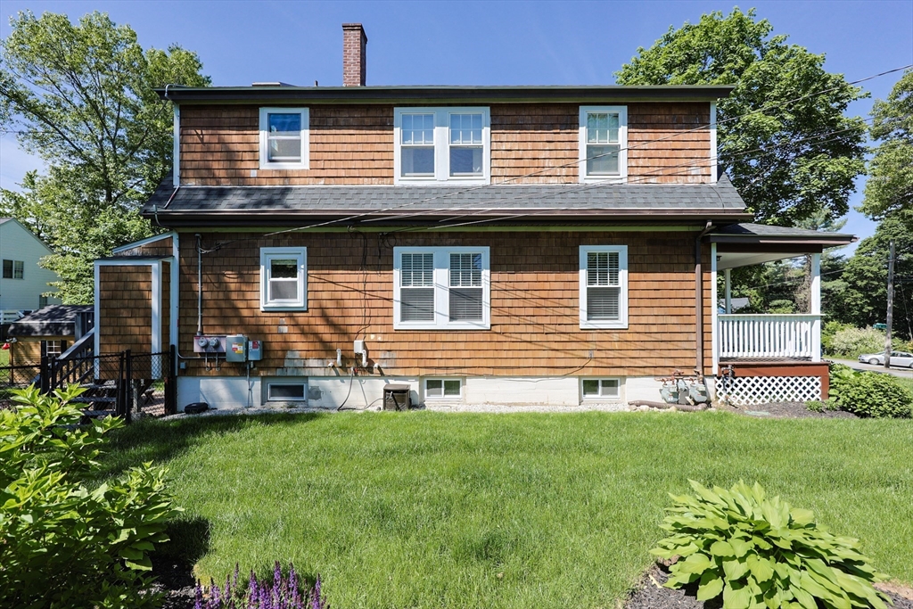 22 Stubb Street, Unit 1 Franklin, MA 02038 - Photo 42 of 42 a front view of a house with garden