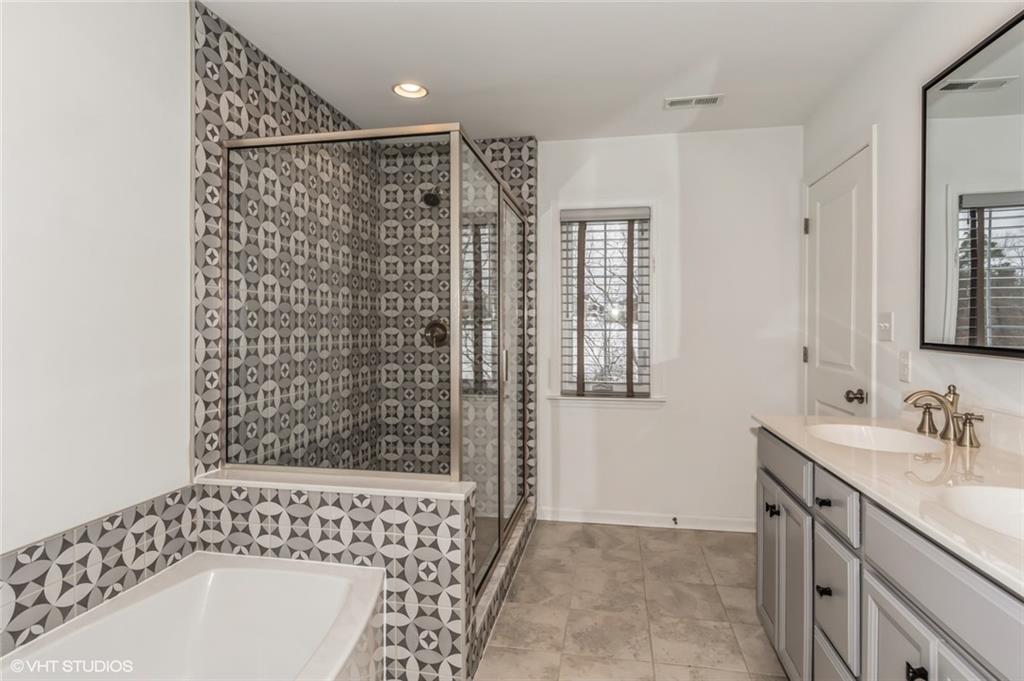 616 Gratitude Road Cranberry Township, PA 16066 - Photo 15 of 39 a bathroom with a bathtub and shower