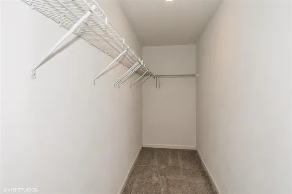 a view of a room with racks on the wall