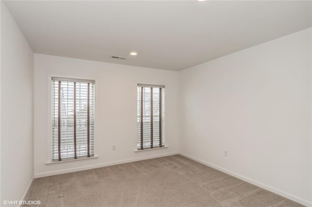 616 Gratitude Road Cranberry Township, PA 16066 - Photo 17 of 39 an empty room with windows