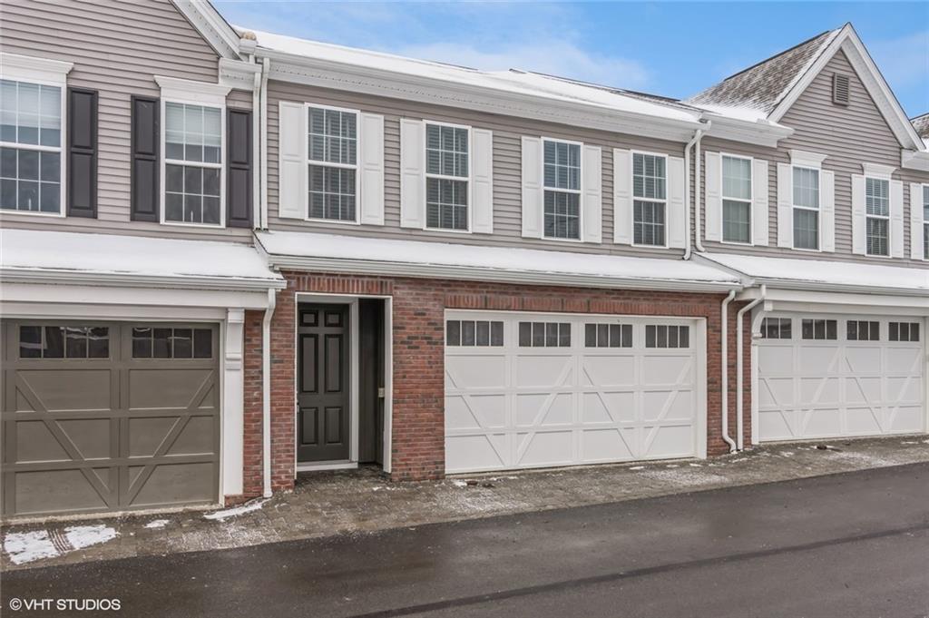 616 Gratitude Road Cranberry Township, PA 16066 - Photo 2 of 39 a front view of a building with a parking space