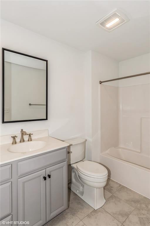 616 Gratitude Road Cranberry Township, PA 16066 - Photo 21 of 39 a bathroom with a toilet a sink and a mirror