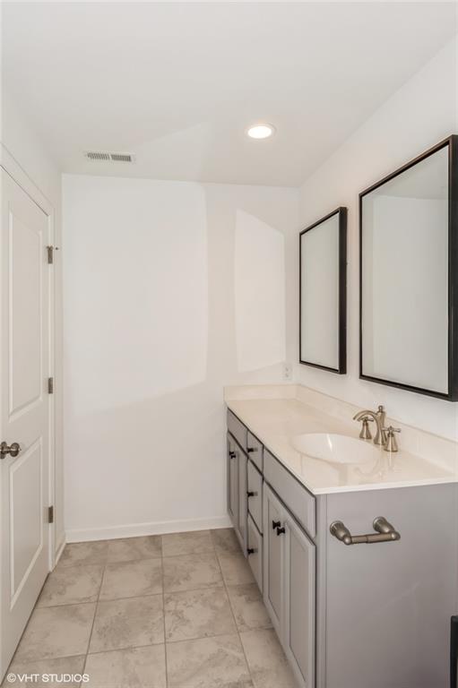 616 Gratitude Road Cranberry Township, PA 16066 - Photo 22 of 39 a bathroom with a sink a mirror and a shower