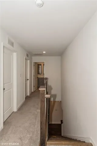 a view of a storage & utility room with a sink