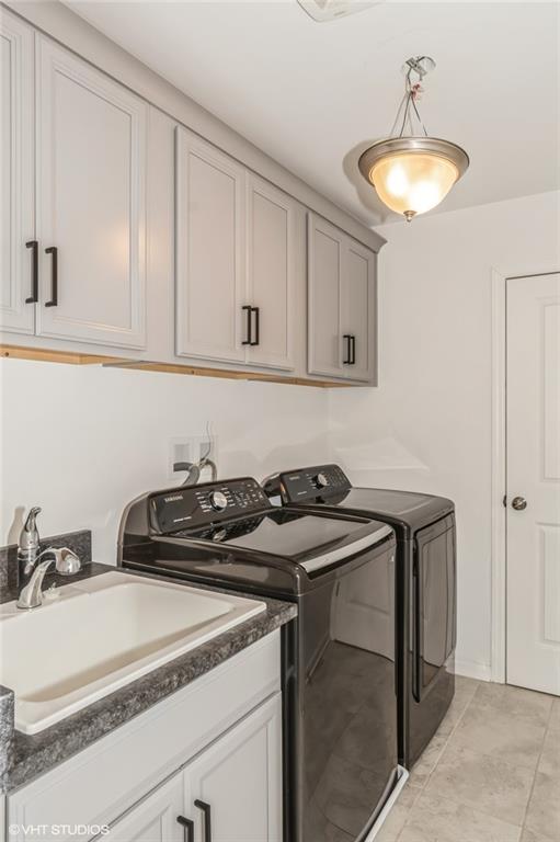 616 Gratitude Road Cranberry Township, PA 16066 - Photo 26 of 39 a kitchen with a sink and cabinets
