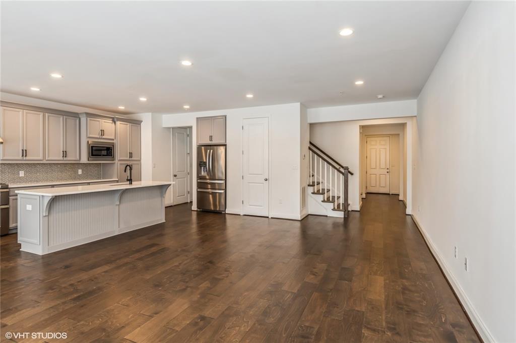 616 Gratitude Road Cranberry Township, PA 16066 - Photo 5 of 39 a view of kitchen with cabinets and wooden floor