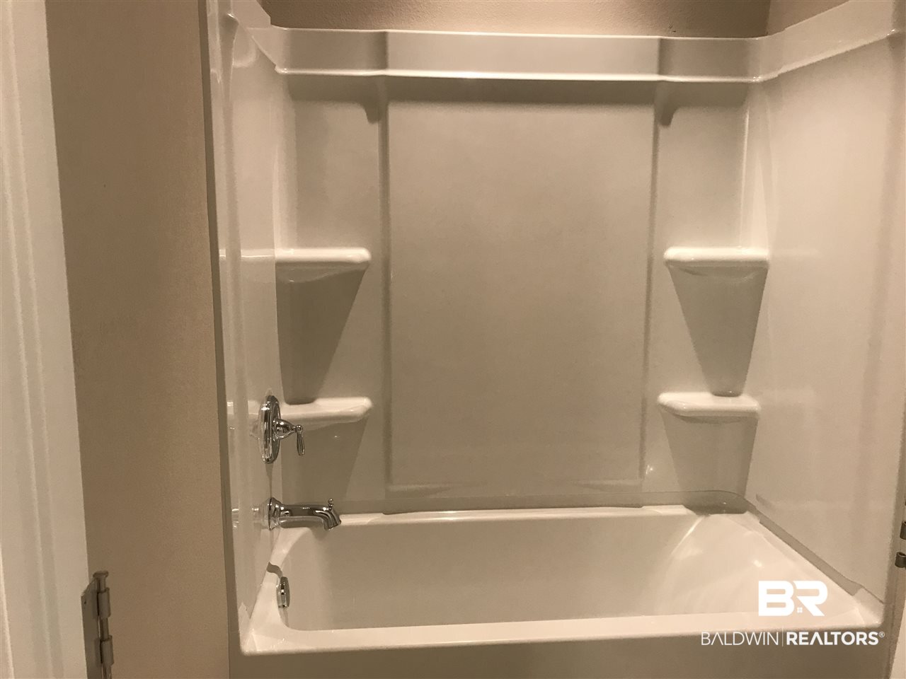 1406 Hickory Street South, Unit 5 Foley, AL 36535 - Photo 16 of 18 Hall Bath Tub/Shower