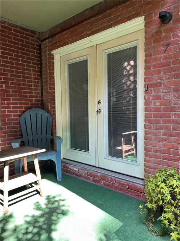 1822 North Rock Springs Road Northeast, Unit 7 Atlanta, GA 30324 - Photo 20 of 21 a view of an outdoor space with porch and patio