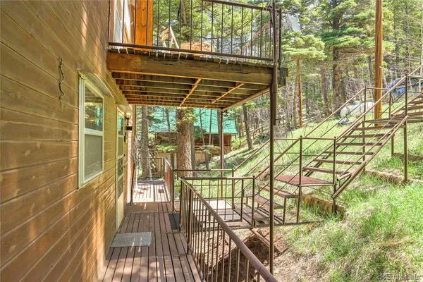 a view of balcony with glass door and outdoor space