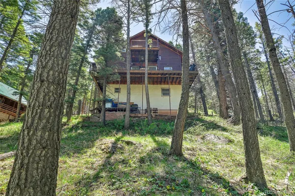 a view of a house with a swimming pool