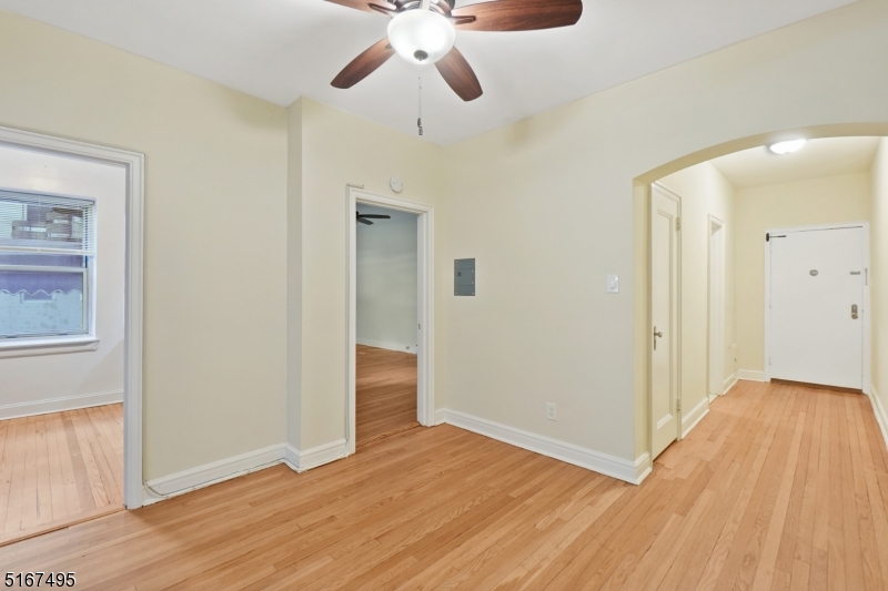 10 North Ridgewood Road, Unit 114 South Orange, NJ 07079 - Photo 9 of 15 a view of an empty room with wooden floor