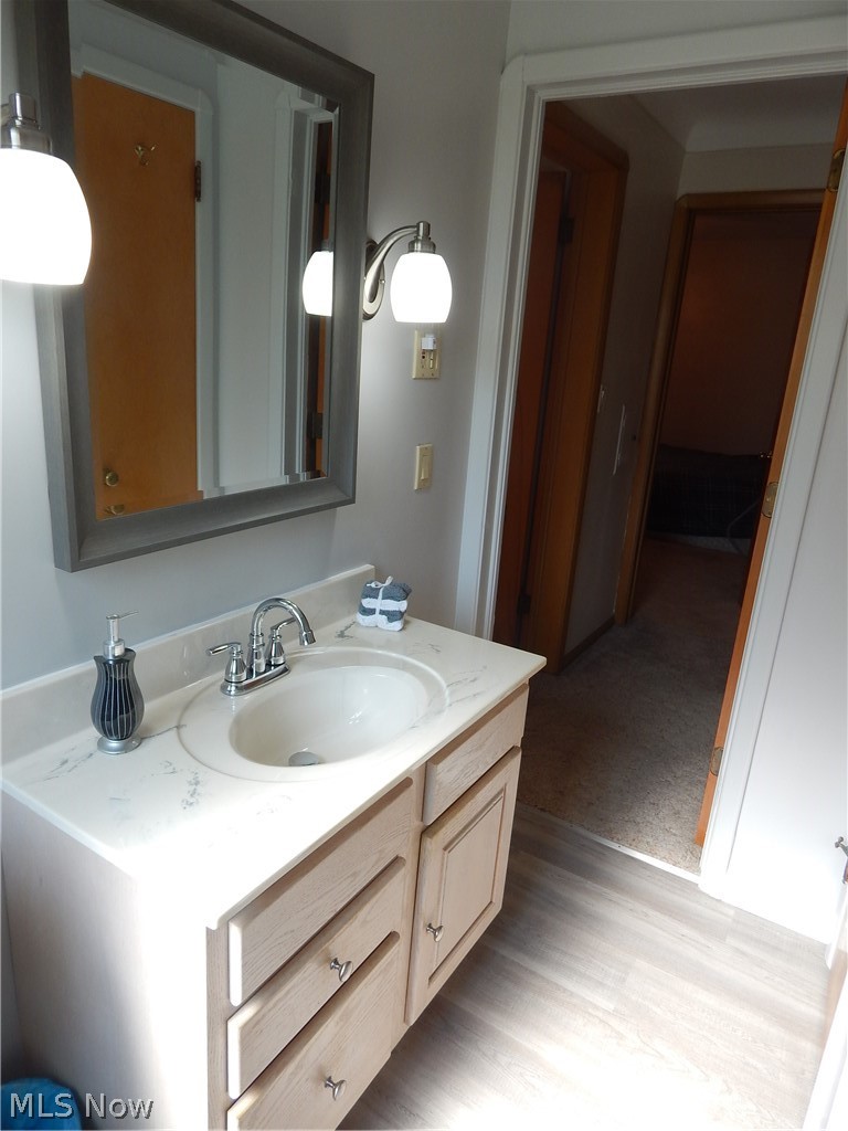 2100 West Sprague Road Cleveland, OH 44134 - Photo 21 of 34 Total Bathroom remodel. New Luxe Vinyl flooring, Tub Surround, Toilet and All fixtures.