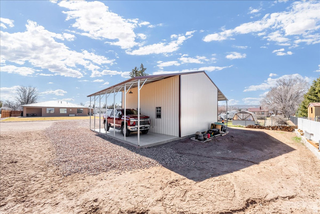 357 East Main Street Enterprise, UT 84725 - Photo 62 of 71 View of outbuilding featuring a carport