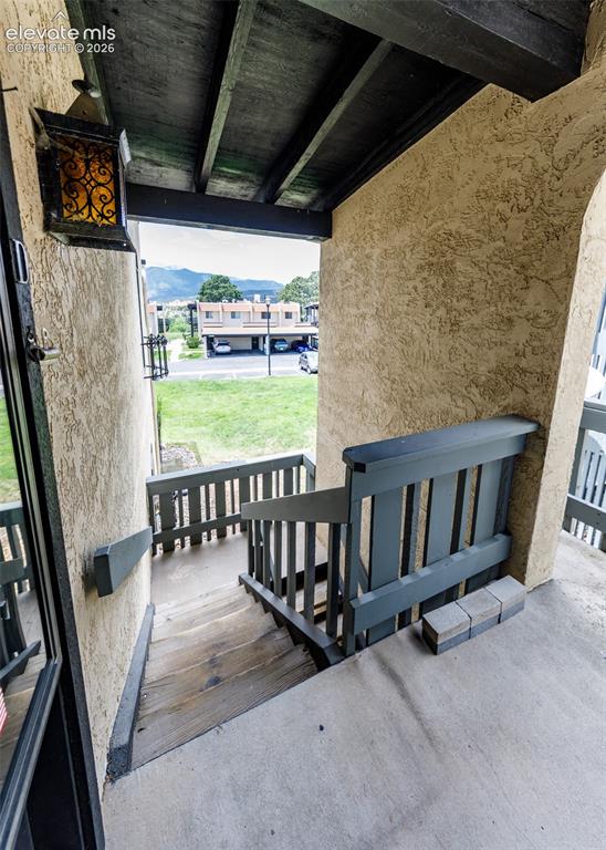 1034 Fontmore Road, Unit D Colorado Springs, CO 80904 - Photo 7 of 43 a view of porch with furniture
