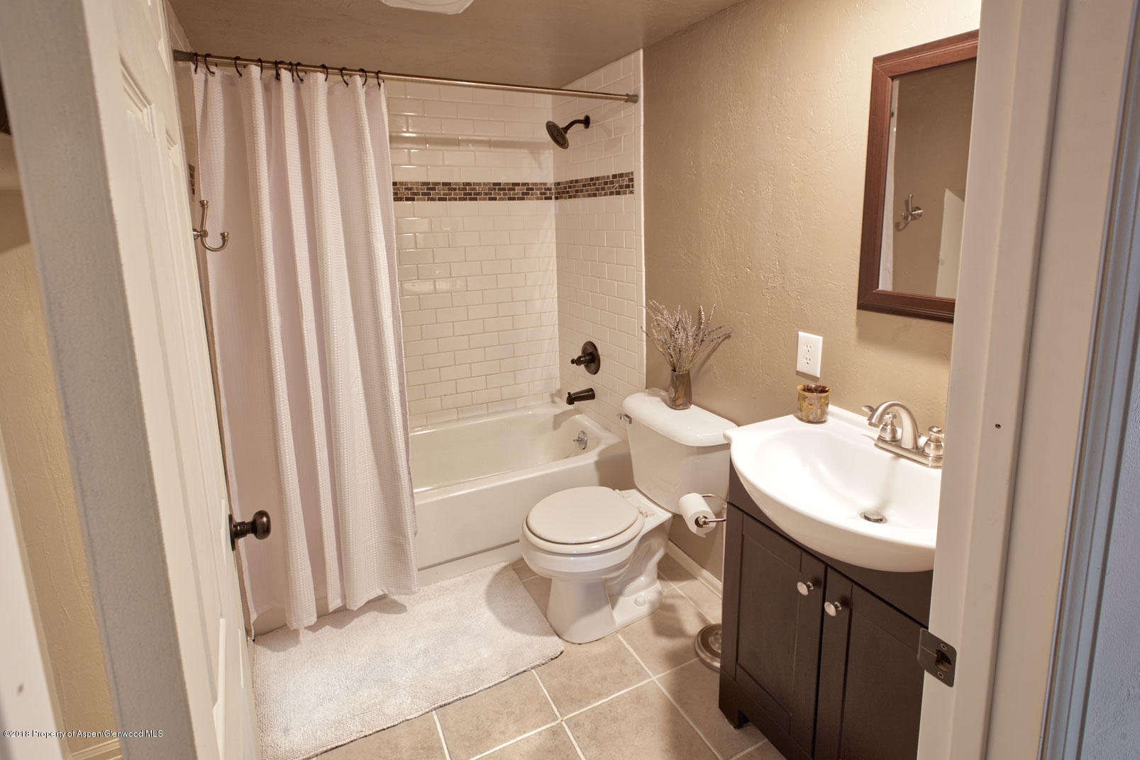 1017 Arnold Court Rifle, CO 81650 - Photo 24 of 28 a bathroom with a sink toilet and shower
