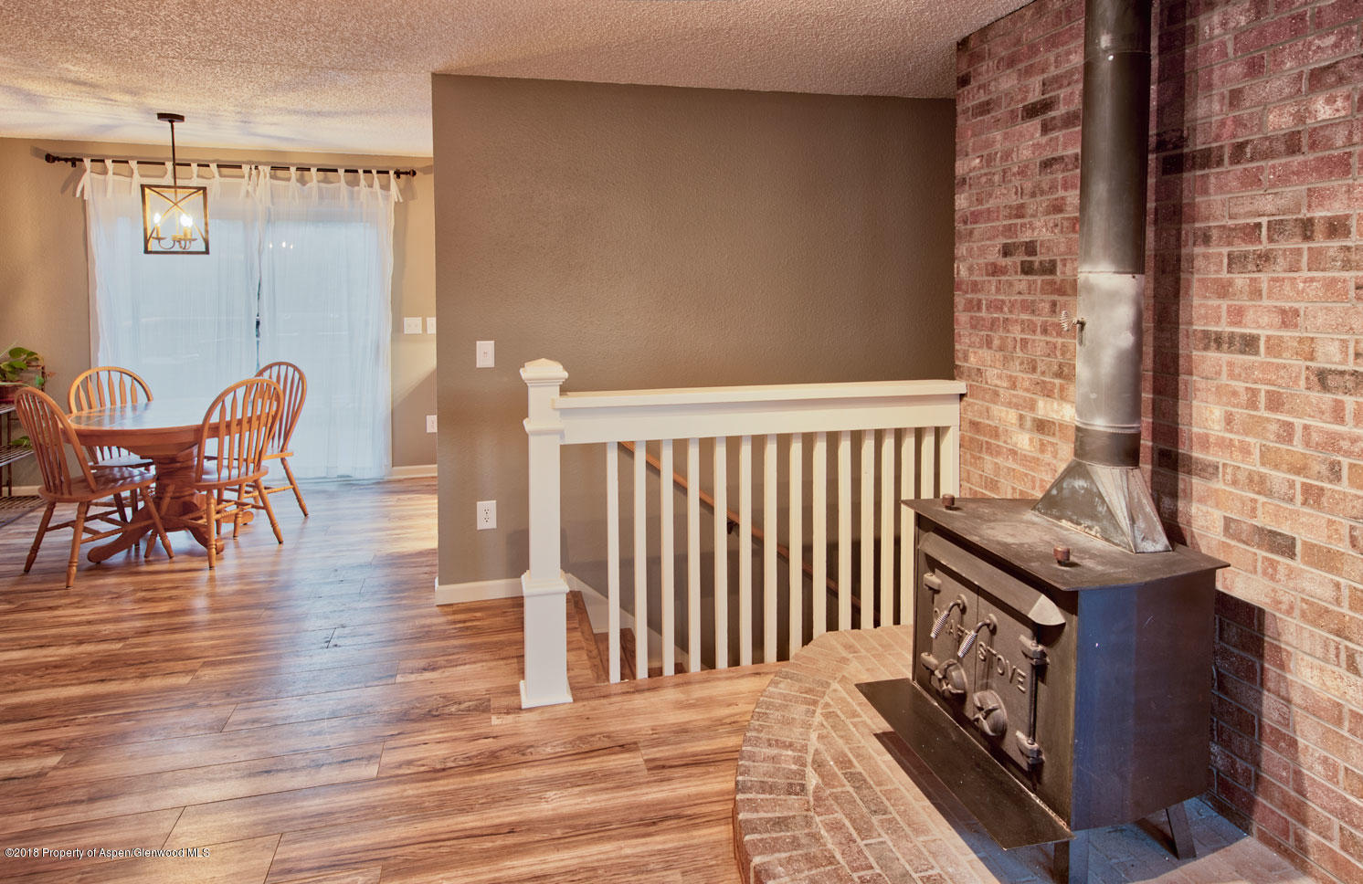 1017 Arnold Court Rifle, CO 81650 - Photo 5 of 28 a view of a chairs and table on the wooden floor