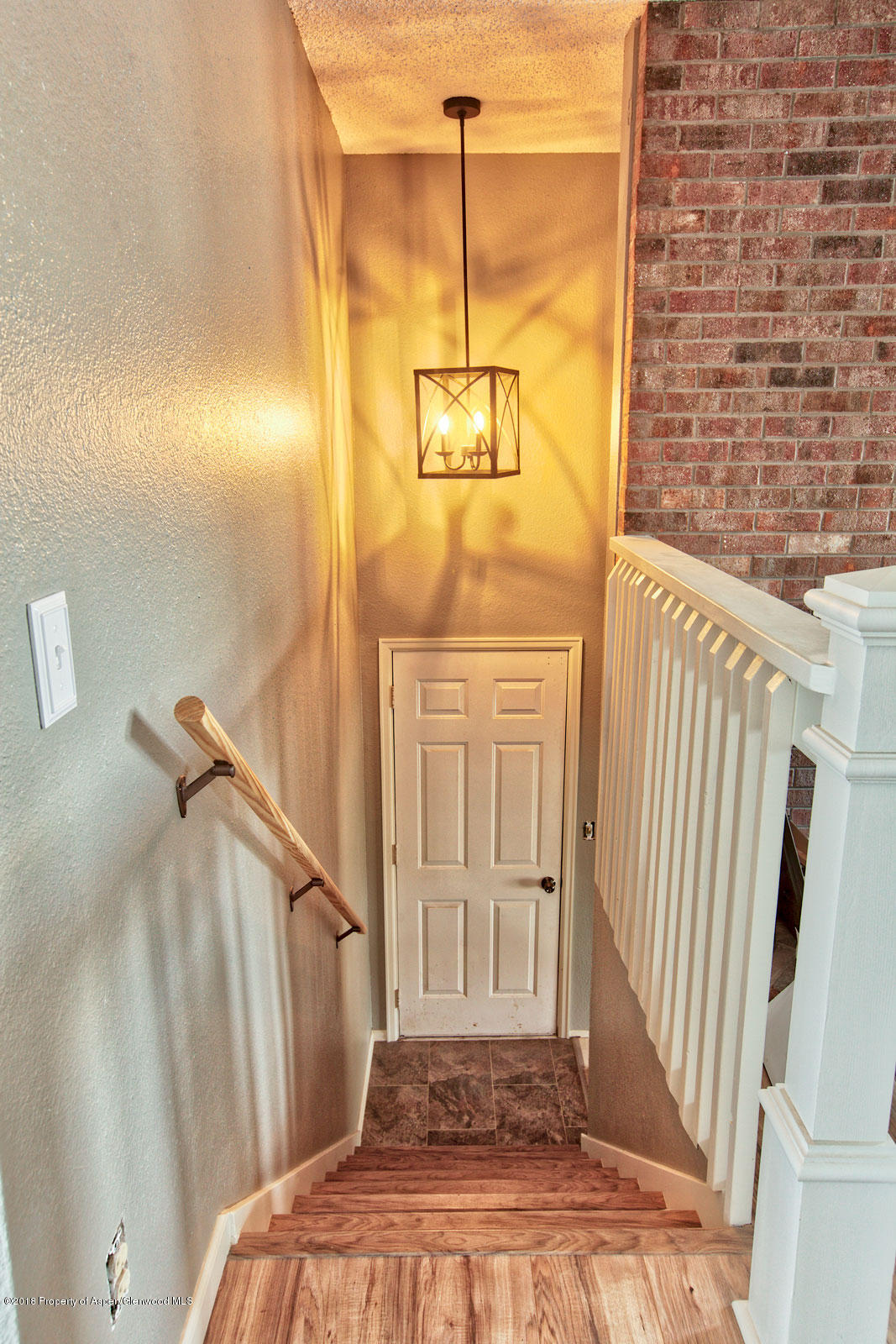 1017 Arnold Court Rifle, CO 81650 - Photo 6 of 28 a view of a balcony with wooden floor