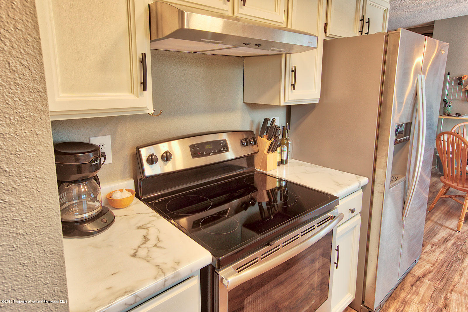 1017 Arnold Court Rifle, CO 81650 - Photo 9 of 28 a kitchen with a stove and a microwave