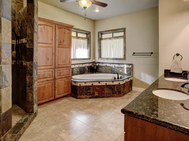 a view of a water heater room with a large window